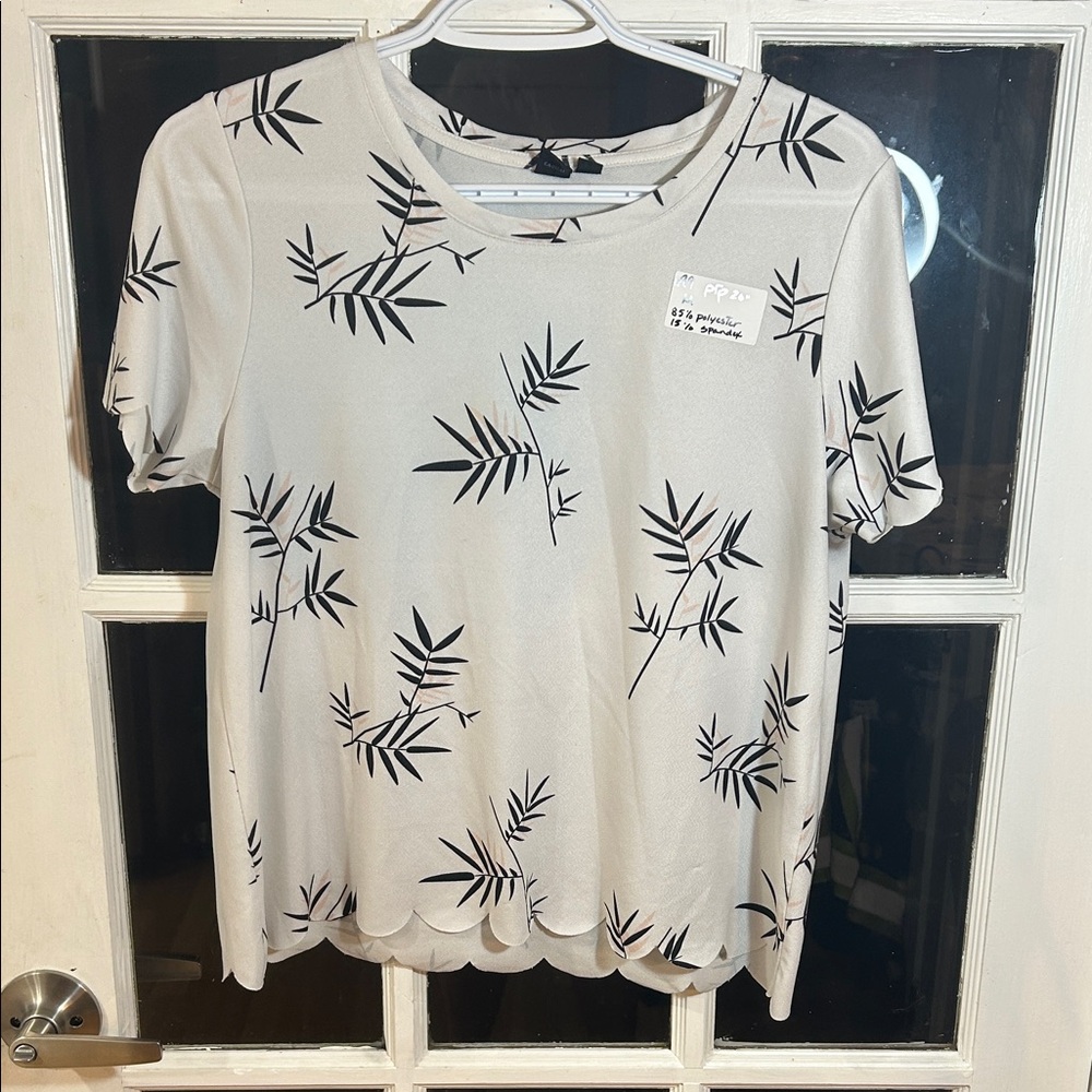 W99. Cream Short Sleeve Top with Black Leaf Print